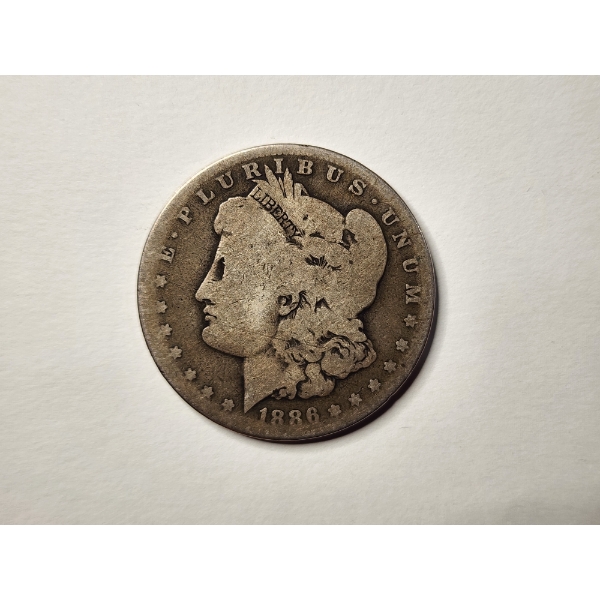 United States 1886-O Morgan Silver Dollar ~ AN EXTREMELY VALUABLE COIN WHEN IN HIGH GRADE CONDITION!