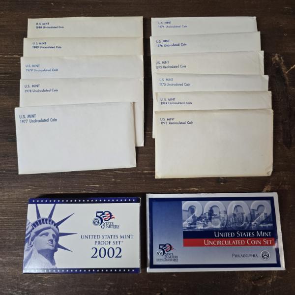 11 Uncirculated Coins Sets 1973-1980, 2002 Proof Set and 2002 Uncirculated Coin Set