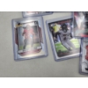 Image 7 : Lot of Assorted Bucky Irving Football Trading Cards - In Protective Holders