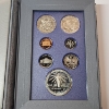 Image 5 : 1986 U.S. Liberty 7-Coin Prestige Set Including 90% Silver Liberty Dollar - OGP Packaging & CoA