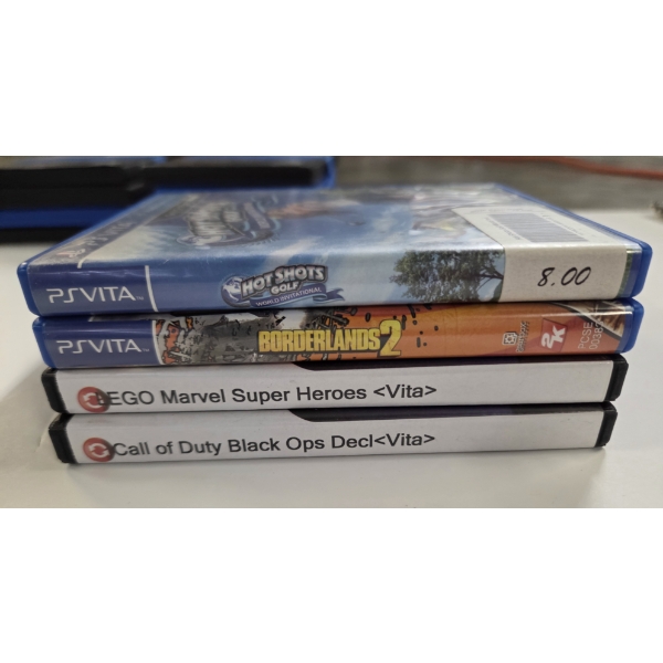 Four Excellent Condition PSVITA Handheld Game Console Game Cartridges 