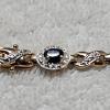 Image 3 : STUNNING!!! .925 Sterling Silver Gold-Tone Oval Sapphire Halo Bracelet With Diamond Chips - 7.5"