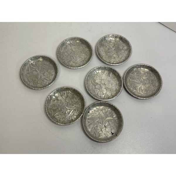 7 Everlast hand-forged aluminum coasters