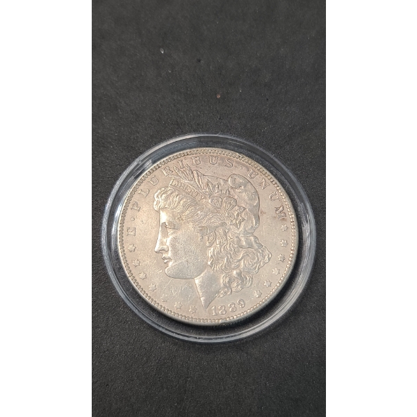 1889 90% Silver Morgan Dollar In Coin Capsule