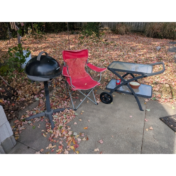 Foreman Grill, Red Chair, and Glass Top Cart