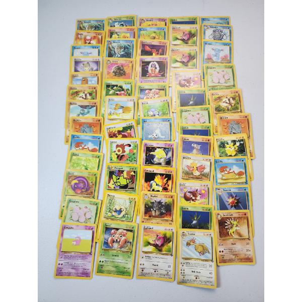 Over 50 Assorted Vintage Pokemon Trading Cards