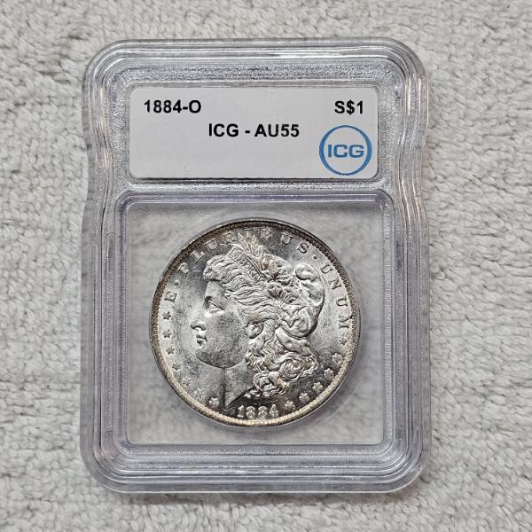 1884-O 90% Silver Morgan Silver Dollar, graded by Independent Coin Graders (ICG) as AU55