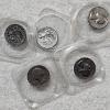 Image 1 : Assortment of US Quarters including State, Bicentennial, and Others FV: $12.00