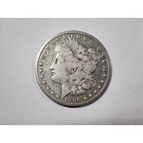 1886-O Morgan Silver Dollar - 90% Silver Coin