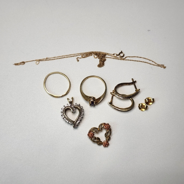 Lot of 10K Gold Jewelry Items: Pendants, Rings, Earrings, Chain - TW: 9.9g