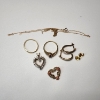 Image 1 : Lot of 10K Gold Jewelry Items: Pendants, Rings, Earrings, Chain - TW: 9.9g