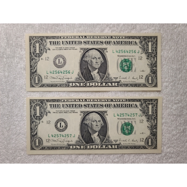 Two Consecutive Serial Number United States One Dollar Bills in Uncirculated Condition