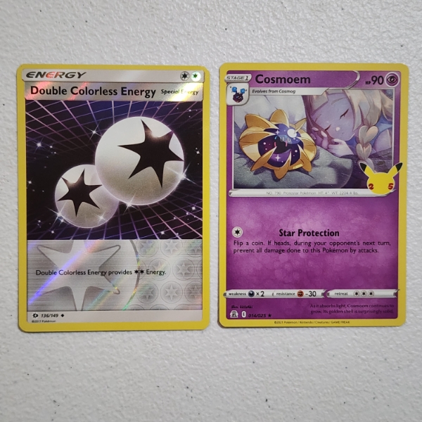 Two Mint Condition Pokemon Trading Cards Holo Rare 25th Anniversary Cosmoem & Rev Holo Energy