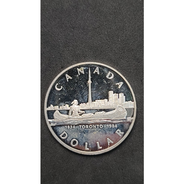 1984 Canadian 150th Anniversary (Sesquicentennial) Of Toronto 50% Silver Dollar - ASW: 0.375oz