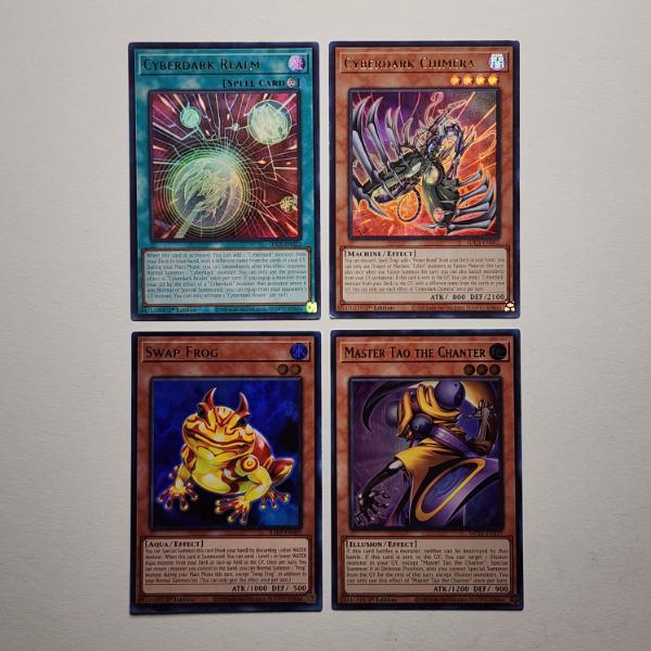 Four Assorted Holo Yu-Gi-Oh Trading Cards 