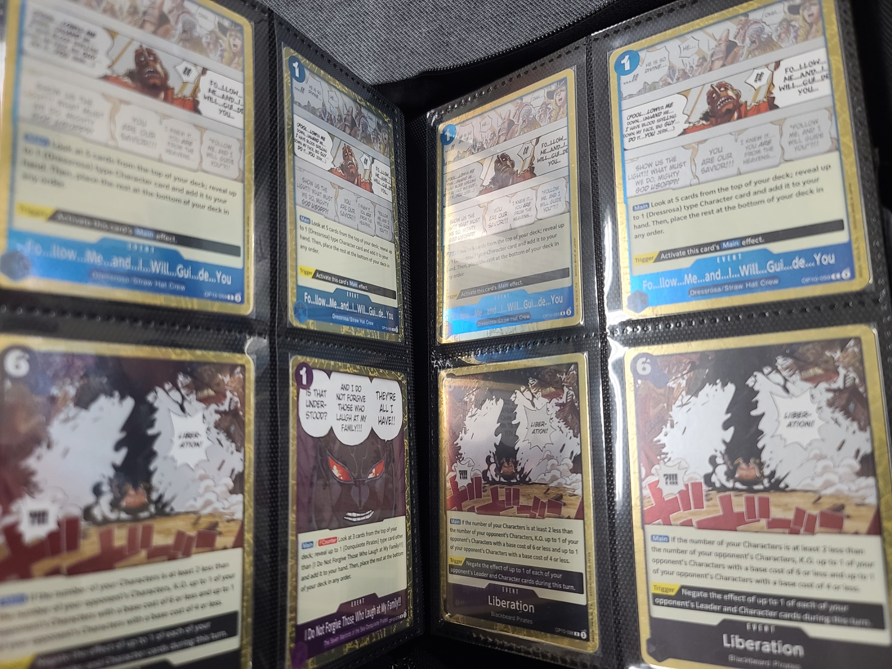 Binder Loaded With Assorted One Piece Trading Cards - 4 Card Per Page Binder - Holds Over 150 Cards - Bosley Auctioneers Binder Loaded With Assorted One Piece Trading Cards - 4 Card Per Page Binder - Holds Over 150 Cards - Bosley Auctioneers