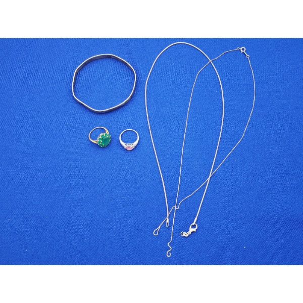 Nice Assortment of Sterling Silver Jewelry Including 2 Chains, 2 Rings, and Bangle TW: 26.0g