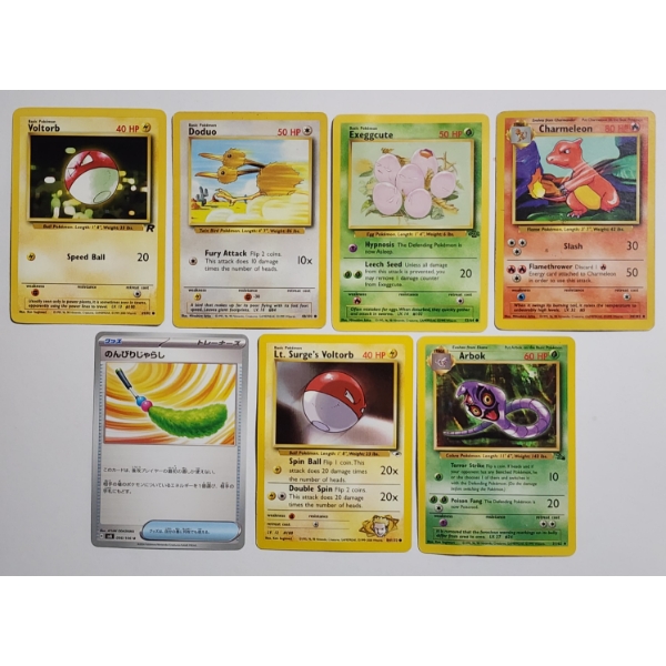 Seven Assorted Vintage Pokemon Trading Cards Including Lt. Surge's Voltorb! 