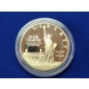 Image 1 : 1986-S Ellis Island Silver Dollar in Protective Capsule - 90% Silver