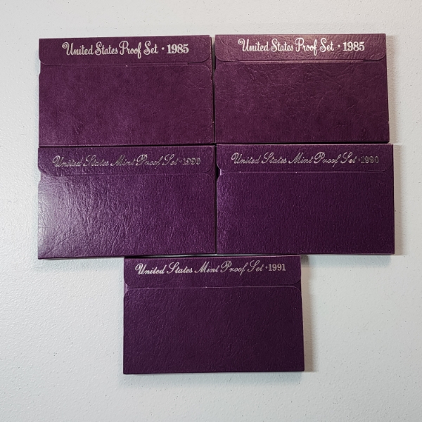 Five Assorted United States Mint Proof Sets: 1985, 1985, 1990, 1990, 1991