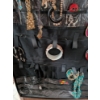 Image 3 : Over Door Organizer Of Costume Pieces Shown