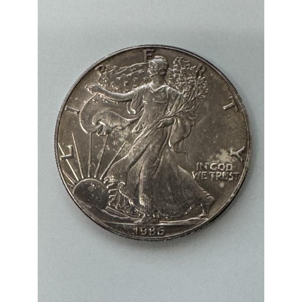 1986 Walking Liberty .999 Fine American Silver Eagle - One Troy Ounce - First Year 