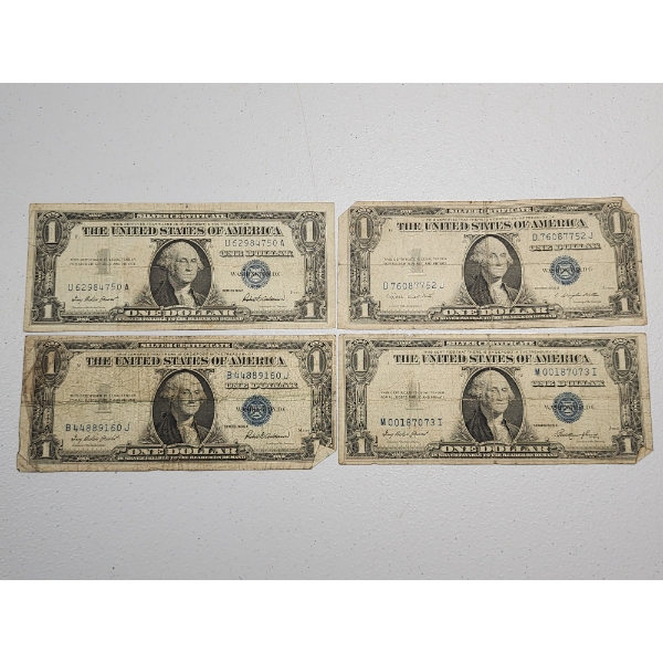 Four U.S. $1 Blue Seal Silver Certificates Series: 1957, 1935-F, 1935-G, 1935-E