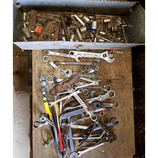 Assorted Wrenches and Sockets in Metal Tool Box