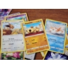 Image 4 : Lot of Assorted Pokemon Trading Cards With Pokemon Watch Ft. Holo, Reverse Holo & Common Cards!