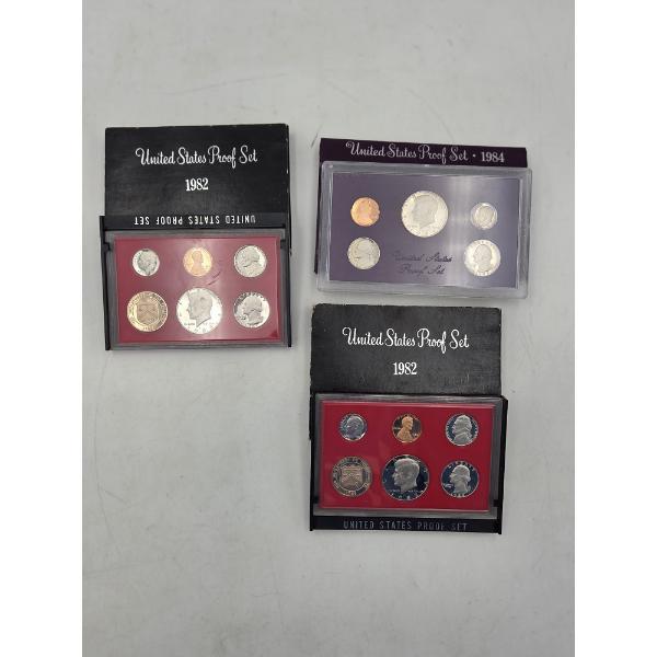 Two 1982 United States Mint Proof Sets And One 1984 United States Mint Proof Set