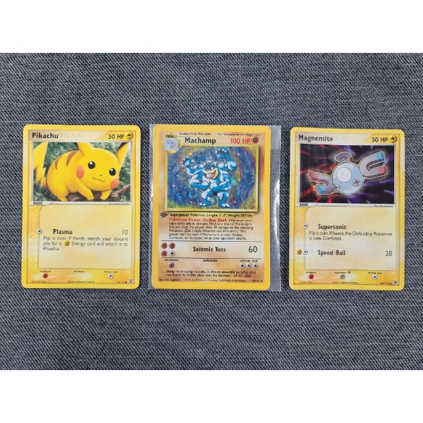 Three Pokemon Trading Cards Ft. 1st Edition Holo Machamp in NM Condition 