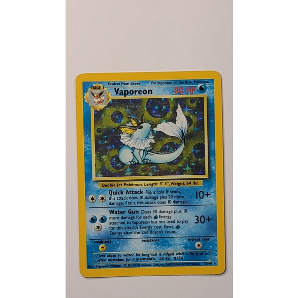 Vintage Vaporeon #12/64 HOLO RARE Pokemon Trading Card From The Jungle Set - Near Mint Condition