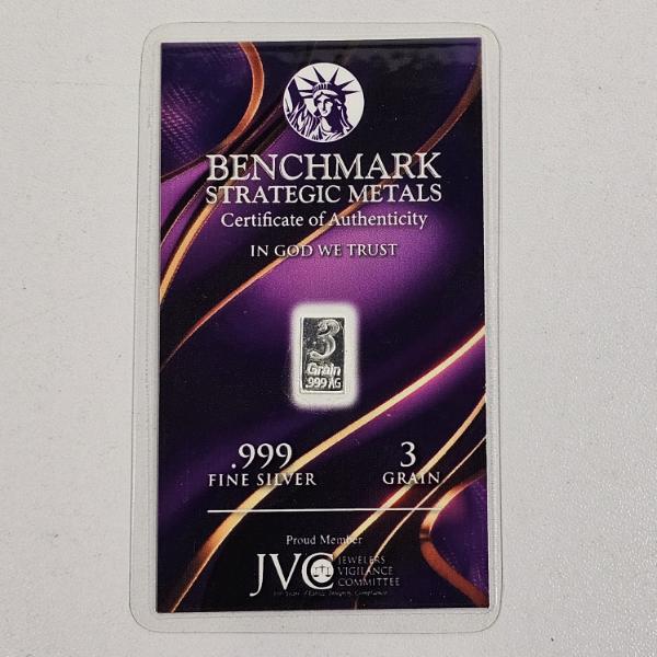 3-grain .999 Fine Silver Bar produced by Benchmark Strategic Metals, featuring a Purple Lava Design