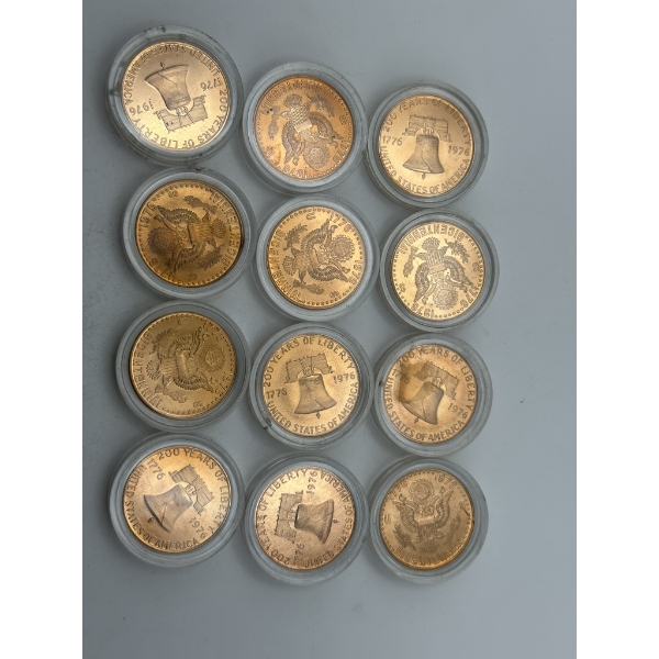 Twelve 1/4 oz Commemorative Bicentennial Copper Rounds in Plastic Holders