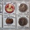 Image 4 : Binder Page of Assorted Tokens/Medals: Mardi Gras, Mason's, Railways Tokens, & More!