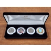 Image 1 : Four Assorted Kennedy Half Dollars in Protective Cases With Display Box from The Matthew Mint