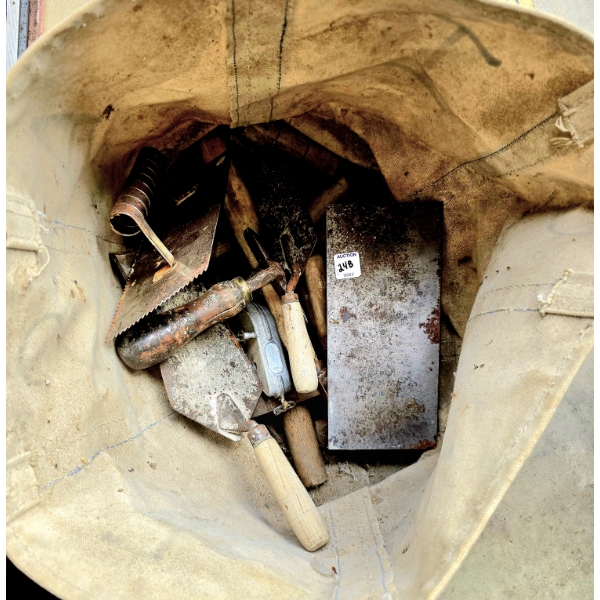 Heavy Duty Canvas Bag Full of Masonry Tools