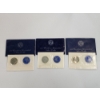 Image 1 : (3) Uncirculated Eisenhower "Blue Pack" Silver Dollars Years: 1974, 1971, 1972