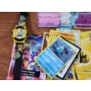 Image 2 : Lot of Assorted Pokemon Trading Cards With Pokemon Watch Ft. Holo, Reverse Holo & Common Cards!