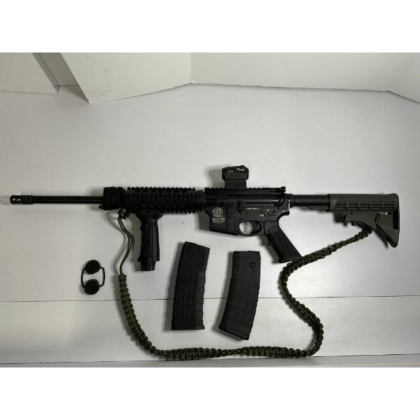 Smith and Wesson MP-15 AR Style Rifle - .556 NATO w/ SYG Romeos Scope & Two Mags.