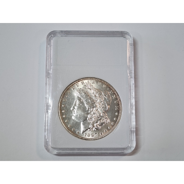 1887 90% Silver Morgan Dollar in Protective Slab Holder