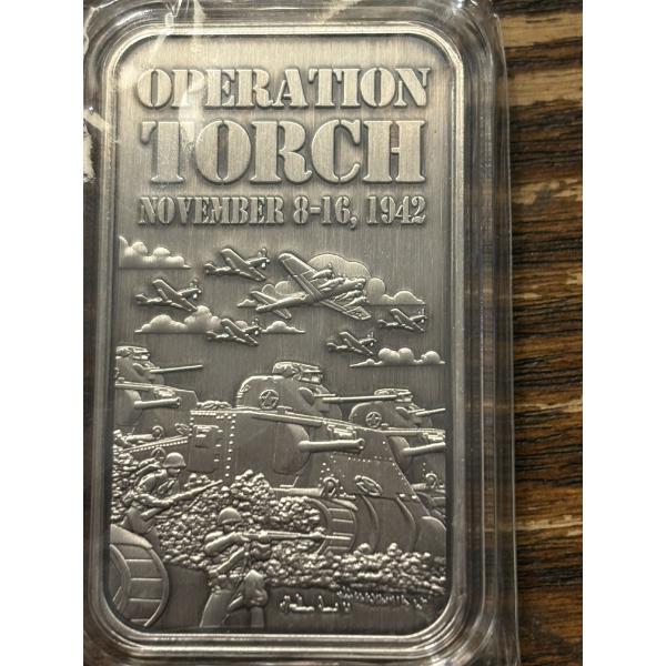 Operations Torch November 8-16, 1942 1 Troy Ounce .999 Fine Silver Bar in Plastic Packaging 