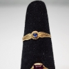 Image 2 : Two 10K Yellow Gold Rings: Blue Stone Size 3, Red Stone Size 7 - Total Weight: 1.7g