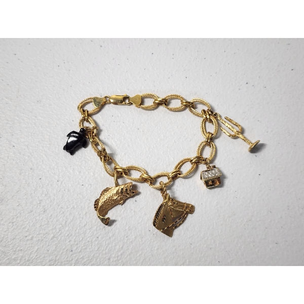 14K Gold 7in Charm Bracelet with Various 14K Gold Charms TW: 14.0g