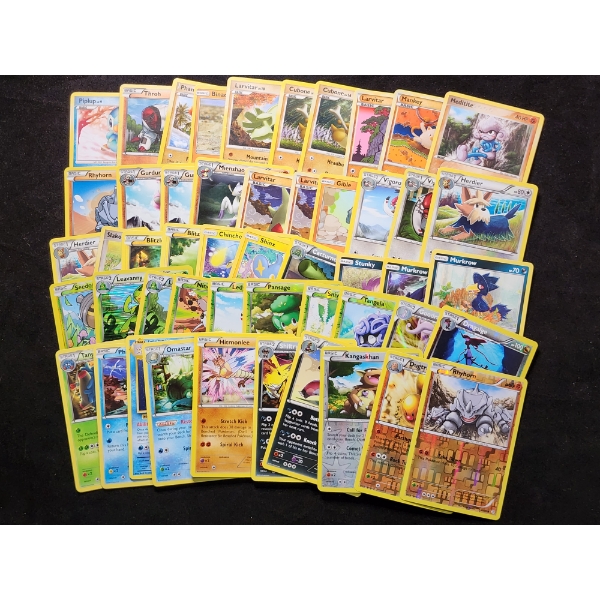 Large Lot of 50 Pokemon Trading Cards Including Holo's, Reverse Holo's & Rares!
