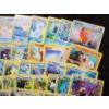Image 5 : Large Lot of 50 Pokemon Trading Cards Including Holo's, Reverse Holo's & Rares!