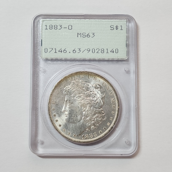 PCGS Old Label Graded MS63 United States 1883-O 90% Silver Morgan Dollar 