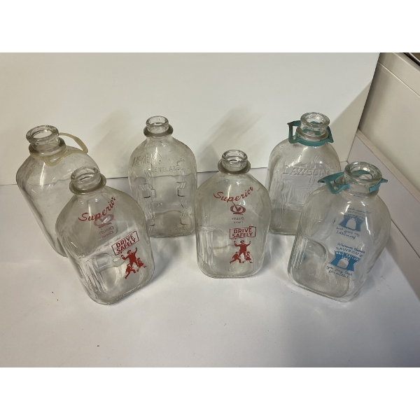 Crate of Vintage Milk Jugs