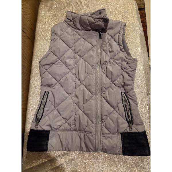 Three Like New Size Medium Vests 