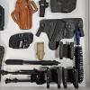 Image 3 : Tactical Firearm Holsters, Support Gear, And Maintenance Accessories Flat Lay Layout